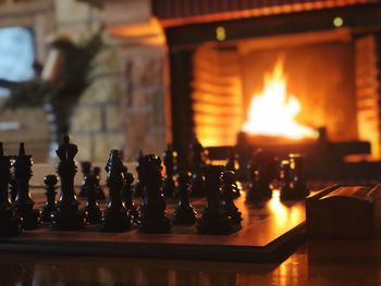 Close-up of chess pieces on table