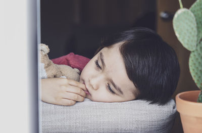 Portrait of boy sleeping at home