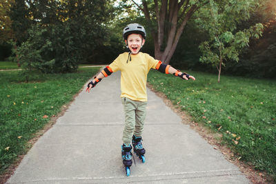 Full length portrait of boy skating at park