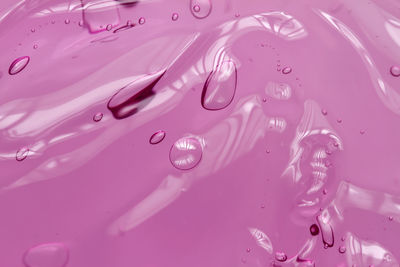 Full frame shot of wet pink paint