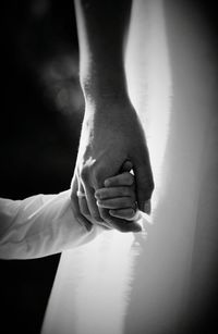 Close-up of woman holding hands