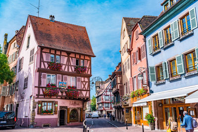 Buildings in city against sky