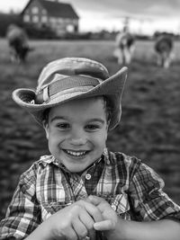 Side view of woman wearing hat