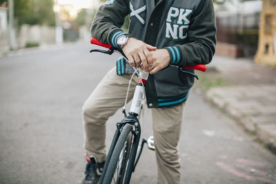 Man riding bicycle on street