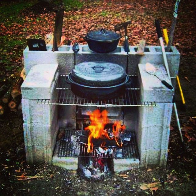 burning, front or back yard, flame, fire - natural phenomenon, high angle view, heat - temperature, wood - material, leaf, orange color, abandoned, outdoors, plant, no people, autumn, metal, flower, day, obsolete, container, old