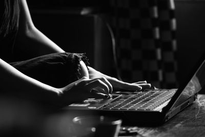 Close-up of man using mobile phone