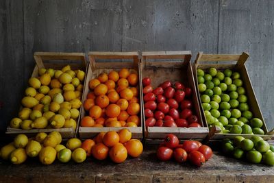 Fruits and vegetables for sale at market stall