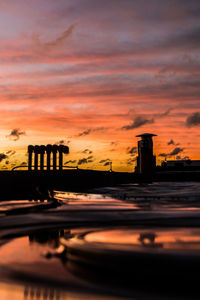 Scenic view of bridge against sky during sunset