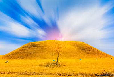 Scenic view of desert against sky