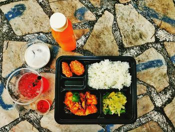 Directly above shot of meal with drinks on table