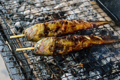 Grilled fish on the barbecue in the market.