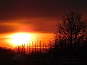 Scenic view of landscape at sunset