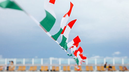 Close-up of flag against sky