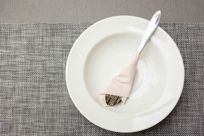 High angle view of empty plate on table