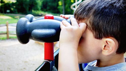 Close-up of boy in park