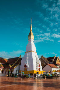 View of buildings against blue sky