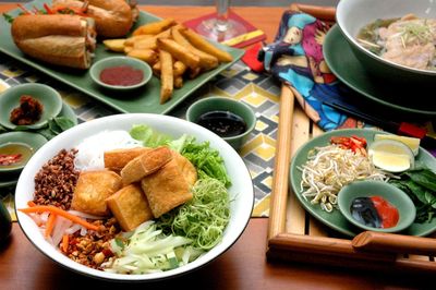 High angle view of vietnamese dishes served on table