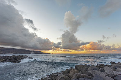 Scenic view of sea against sky during sunset