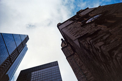 Low angle view of skyscrapers against sky
