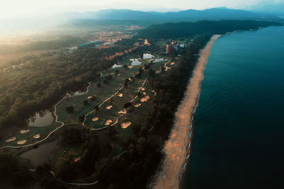 High angle view of cityscape by sea