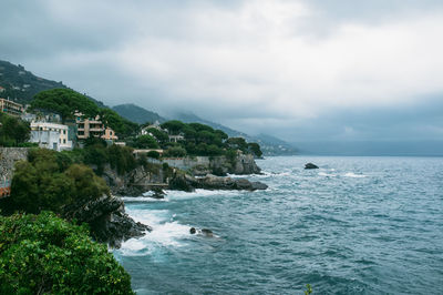 Scenic view of sea against cloudy sky