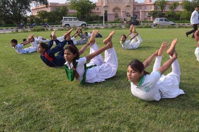 People lying on grass