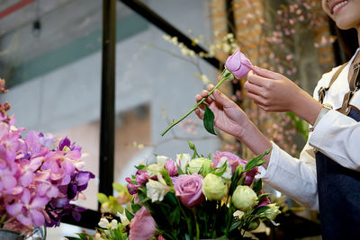 Midsection of florist working in shop