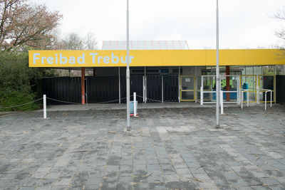 Information sign in front of building