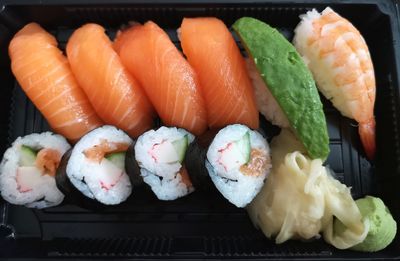 High angle view of sushi served in container