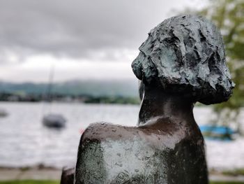 Close-up of statue against sky