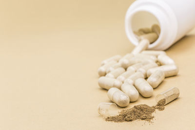 Close-up of coffee beans on table