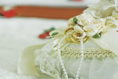 Close-up of rose bouquet on white table