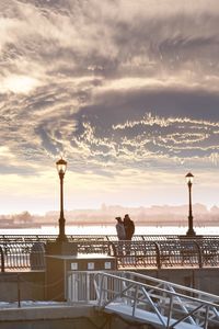 View of bridge in city during sunset