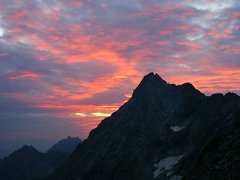 Scenic view of mountains against sky during sunset