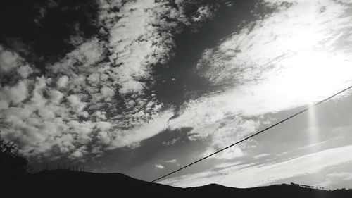 Low angle view of silhouette mountain against sky