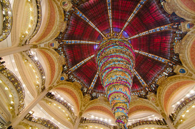 Low angle view of illuminated ceiling in building