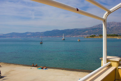 Scenic view of sea against cloudy sky