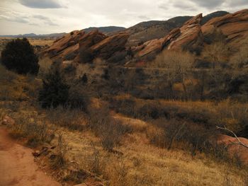 View of landscape against cloudy sky