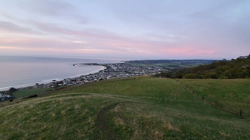 Scenic view of sea against sky during sunrise