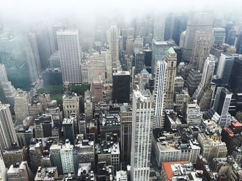 High angle view of modern buildings in city