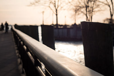 Close-up of railing against sky