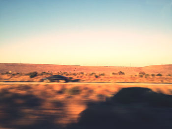 Scenic view of land against clear sky