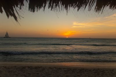 Scenic view of sea against sky during sunset