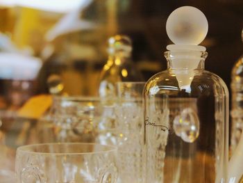 Close-up of glass jars on table