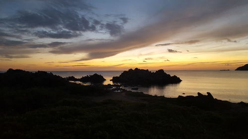 Scenic view of sea against sky during sunset