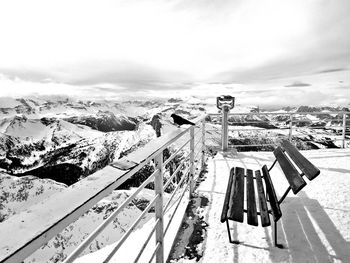 High angle view of snowcapped mountains against sky