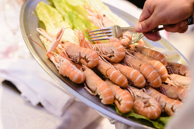 Midsection of person preparing food