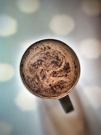 Close-up of cappuccino on table