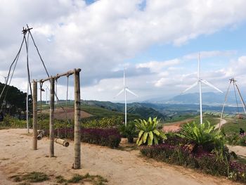 Scenic view of farm against sky