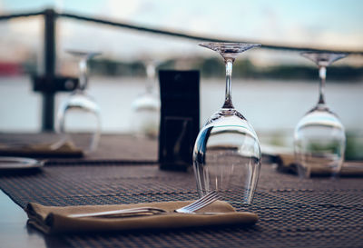 Empty wineglasses arranged on table